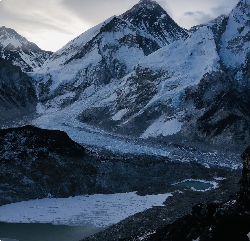 Panoramic view of the snow-covered Himalayan mountains along the Everest Base Camp Trek route in Nepal.
